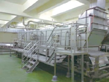 Continuous cooking machine